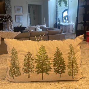Embroidered Christmas tree pillow.